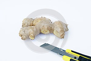 Ginger and a knife with white background