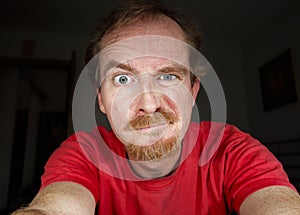 Ginger man looking to screen