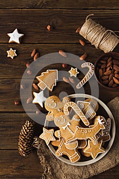 Ginger men on a wooden background.. Christmas cookies