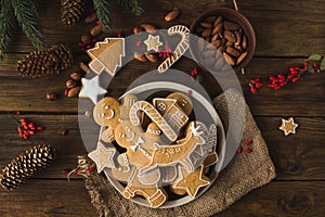 Ginger men on a wooden background. Gingerbread. Christmas cookies