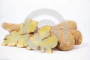 Ginger root close-up on white background.
