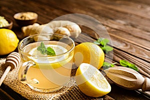 Ginger root tea with lemon, honey and mint