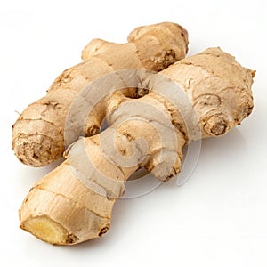 Ginger root on a white background, showcasing its natural texture and unique shape