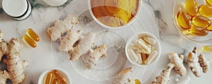 Ginger, turmeric, and supplements arranged on a marble background