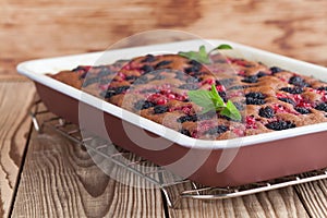 Gingerbread cake with mulberries and red currants