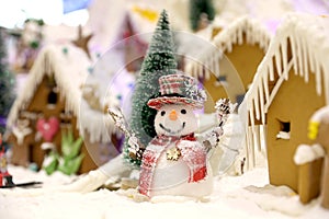Gingerbread christmas decoration with snowman and different decorations.