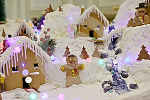 Gingerbread christmas decoration with snowman and different decorations.