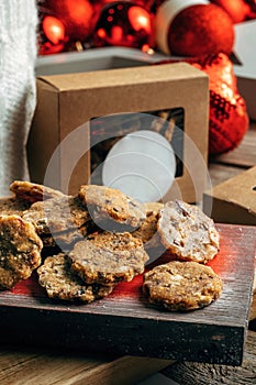 Gingerbread Cookie. Rustic style Christmas table decoration with wooden planks.