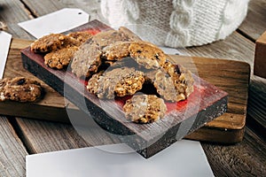 Gingerbread Cookie. Rustic style Christmas table decoration with wooden planks.