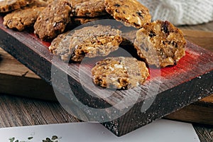 Gingerbread Cookie. Rustic style Christmas table decoration with wooden planks. Copy space