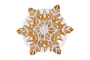 Gingerbread cookie in snowflake shape isolated on white background