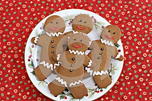 Gingerbread cookies on a Christmas plate.