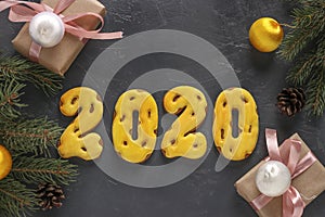 Gingerbread cookies in the form of numbers 2020, gifts christmas or Noel holiday, Happy New Year, festive background