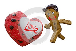 The gingerbread cookies man running chasing the heart-shaped cookie with text Love, isolated on white background