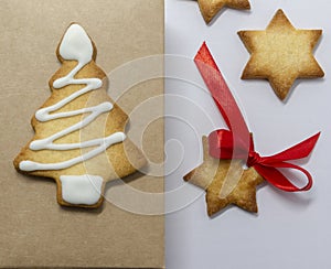 Gingerbread cookies. Natural paper background and white background. Christmas baking background. New Year theme. Merry