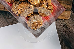 Gingerbread cookies. Rustic Christmas table decorated with wooden planks. Top view