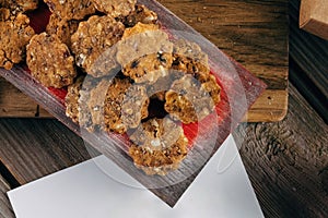 Gingerbread cookies. Rustic Christmas table decorated with wooden planks. Top view