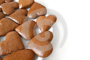 Gingerbread hearts stacked side by side, can be used as a greeting card for Valentine`s Day