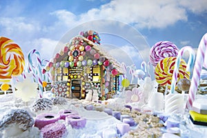 Gingerbread house in christmas landscape