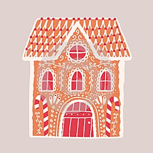 Gingerbread house isolated on light background. Decorative confection shaped like building. Beautiful delicious dessert