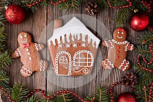 Gingerbread house, man and woman cookies christmas