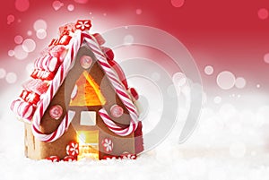 Gingerbread House, Red Background With Snowflakes, Copy Space