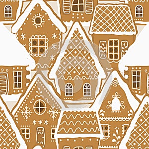 Gingerbread houses on a caramel background. Seamless pattern. Christmas background