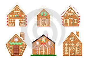 Gingerbread houses set, cute baked town buildings collection with candy and sugar icing