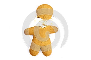 Gingerbread man with broken head isolated on white