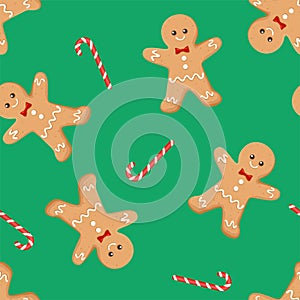 Gingerbread man and candy cane on green background. Christmas seamless pattern.