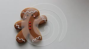 Gingerbread man isolated on white at a side of image concept stock photo for greeting cards or holiday backgrounds