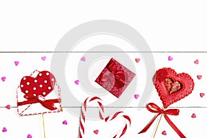 Gingerbread in shape of red heart and envelope for writing on white wooden background Happy Valentine`s day