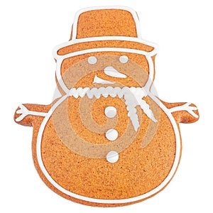 Gingerbread snowman cookie decorated with white icing isolated on white background