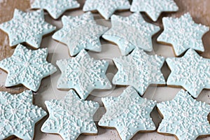 Gingerbread star cookie for Christmas on white background.