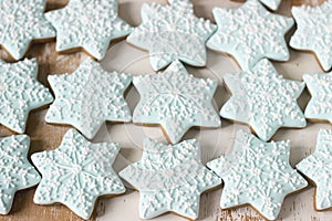 Gingerbread star cookie for Christmas on white background.