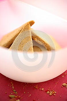 Gingerbreads in white plastic bowl