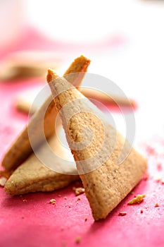 Gingerbreads in white plastic bowl