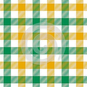 Gingham pattern in yellow, green, white. Bright colorful seamless vichy texture for modern spring summer picnic tablecloth.