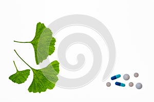 Gingko leaves with various pills