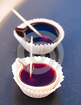 Ginja de Obidos, traditional sour cherry liquor, served in small photo