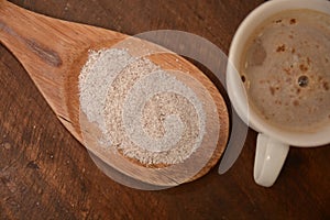 Ginseng and coffee drink in cup on wood table beverages photo