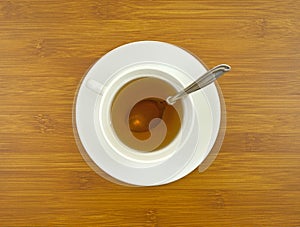 Ginseng tea with spoon on tabletop