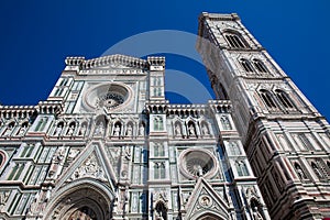 Giotto Campanile and Florence Cathedral consecrated in 1436 against a beautiful blue sky