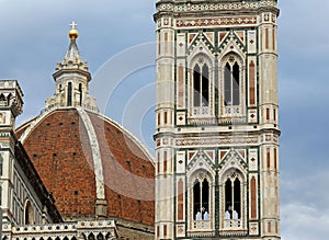 Giottos bell tower and the dome with a golden sphere on it in th