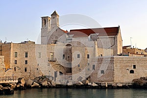 Giovinazzo Cathedral( Bari Puglia Italy ) seen from the sea at sunset