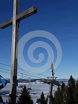 Gipfelkreuz und blauer, winterlicher Himmerl in den  AllgÃ¤uer Alpen NÃ¤he FÃ¼ssen, Bayern