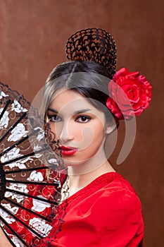 Gipsy flamenco dancer Spain girl with red rose photo