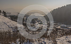 Gipsy village in east Slovakia in winter snow sunny day photo