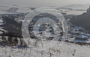 Gipsy village in east Slovakia in winter snow sunny day photo