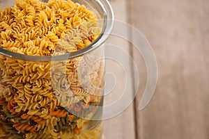 Girandole pasta in a glass container